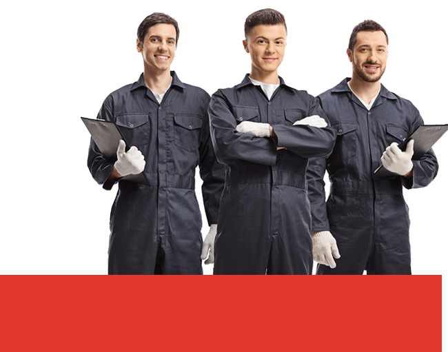 A full shot of three smiling auto mechanics in a gray suit holding a clipboard.